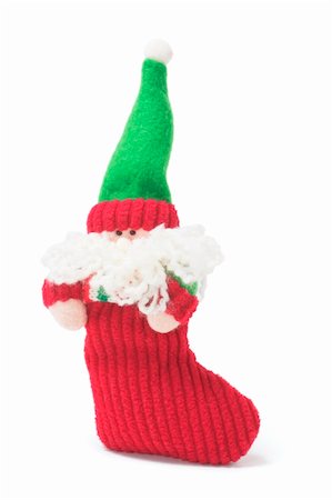 simsearch:400-04774467,k - Santa Figure in Stocking on White Background Fotografie stock - Microstock e Abbonamento, Codice: 400-04774464