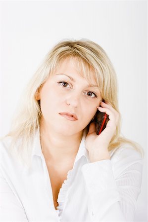 simsearch:400-08038938,k - blonde with mobile phones on a white background Stockbilder - Microstock & Abonnement, Bildnummer: 400-04774588