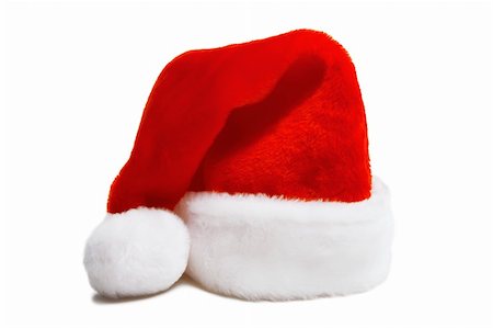 simsearch:400-05701397,k - red furry Christmas hat of Santa Claus. Isolated white background Fotografie stock - Microstock e Abbonamento, Codice: 400-04774596