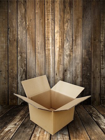 Brown paper box open in Grunge wooden panel and floor room background Stock Photo - Budget Royalty-Free & Subscription, Code: 400-04774647