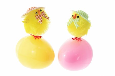 simsearch:400-04775746,k - Toy Chicks on Easter Eggs on White Background Stock Photo - Budget Royalty-Free & Subscription, Code: 400-04774809