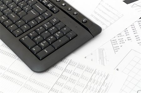 simsearch:400-06566764,k - Financial balance. keyboard stands on stack document Fotografie stock - Microstock e Abbonamento, Codice: 400-04775048