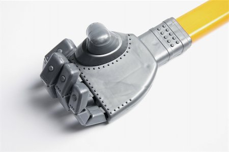 roboterarm - Close Up of Toy Robot Hand Stockbilder - Microstock & Abonnement, Bildnummer: 400-04775181