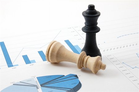 simsearch:400-07974419,k - chess man over business chart admonish to strategic behavior Stockbilder - Microstock & Abonnement, Bildnummer: 400-04775979