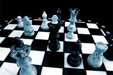 chess pieces on chess board showing competition success and strategy in business Stock Photo - Budget Royalty-Free & Subscription, Code: 400-04775983