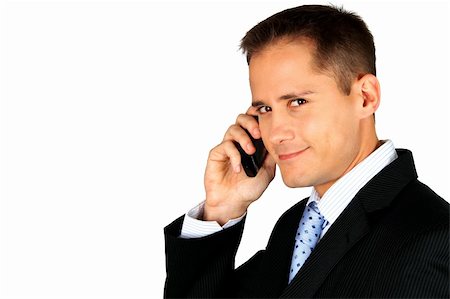simsearch:673-02138722,k - A young handsome business man making a phone call on a smartphone and smiling at the camera Stock Photo - Budget Royalty-Free & Subscription, Code: 400-04777656