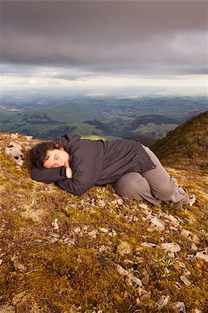 simsearch:400-04509158,k - A woman has a little shuteye on a bed of moss on top of the Ruahine Ranges, North Island, New Zealand Foto de stock - Super Valor sin royalties y Suscripción, Código: 400-04778174