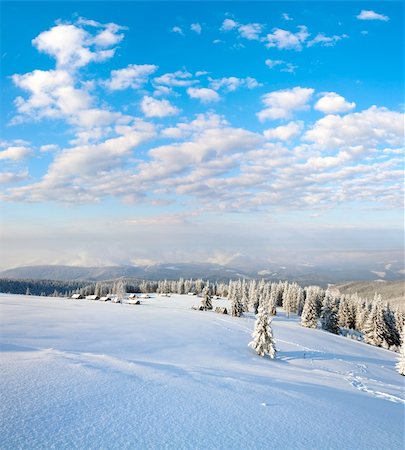 simsearch:400-04319458,k - winter calm mountain landscape with sheds group and mount ridge behind (Kukol Mount, Carpathian Mountains, Ukraine) Stock Photo - Budget Royalty-Free & Subscription, Code: 400-04779194