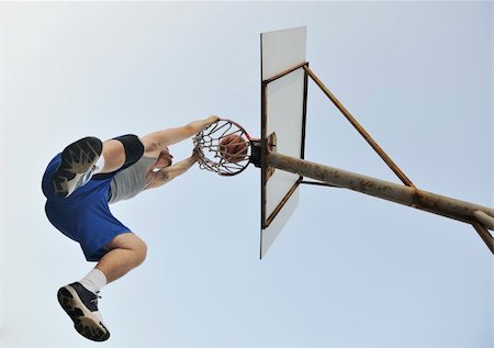 simsearch:400-04779709,k - basketball player practicing and posing for basketball and sports athlete concept Fotografie stock - Microstock e Abbonamento, Codice: 400-04779388