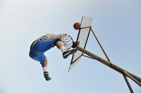 simsearch:400-04779709,k - basketball player practicing and posing for basketball and sports athlete concept Fotografie stock - Microstock e Abbonamento, Codice: 400-04779383