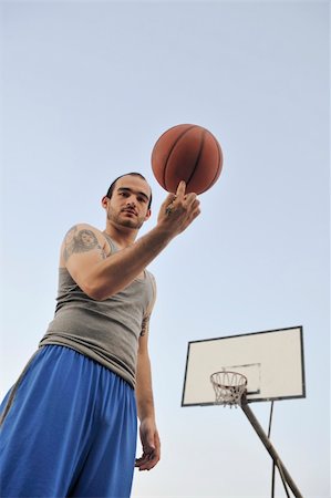 basketball player practicing and posing for basketball and sports athlete concept Stock Photo - Budget Royalty-Free & Subscription, Code: 400-04779415