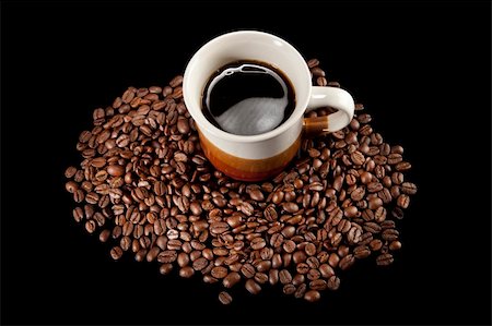 simsearch:400-04313939,k - Coffee cup and beans on black background Stock Photo - Budget Royalty-Free & Subscription, Code: 400-04779416