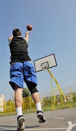 simsearch:400-07515585,k - basketball player practicing and posing for basketball and sports athlete concept Foto de stock - Royalty-Free Super Valor e Assinatura, Número: 400-04779418