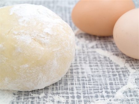 One piece of the test on a table and near it two eggs are located Stock Photo - Budget Royalty-Free & Subscription, Code: 400-04779446