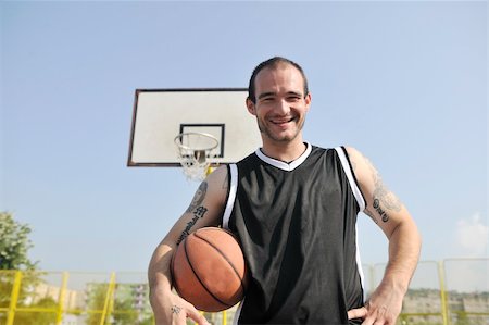 basketball player practicing and posing for basketball and sports athlete concept Stock Photo - Budget Royalty-Free & Subscription, Code: 400-04779604