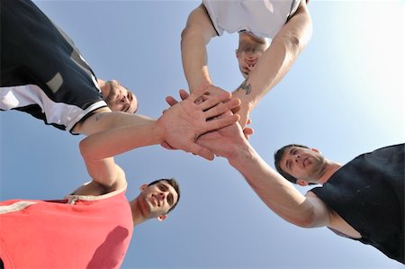 basketball player team group  posing on streetbal court at the city on early morning Stock Photo - Budget Royalty-Free & Subscription, Code: 400-04779706