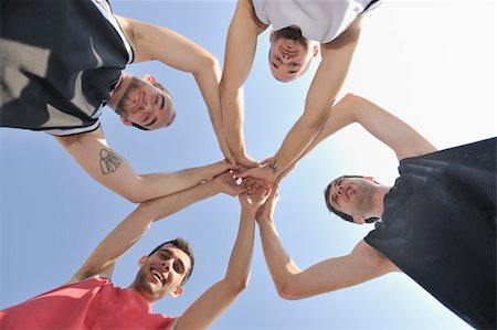 basketball player team group  posing on streetbal court at the city on early morning Stock Photo - Budget Royalty-Free & Subscription, Code: 400-04779709