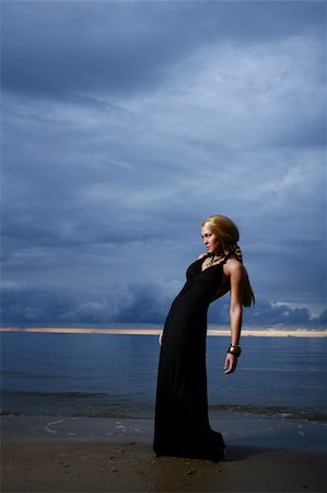 evening dress on beach - sexy and luxury woman on sunset backgroung Stock Photo - Budget Royalty-Free & Subscription, Code: 400-04770814