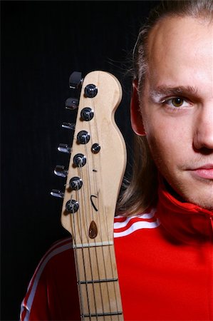 Man with electro guitar Stock Photo - Budget Royalty-Free & Subscription, Code: 400-04770824
