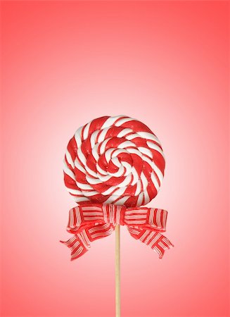 simsearch:400-05918018,k - Colourful lollipop isolated on the red background Photographie de stock - Aubaine LD & Abonnement, Code: 400-04771223