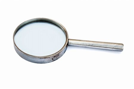 simsearch:400-07753794,k - Close-up to magnifying glass on white background Photographie de stock - Aubaine LD & Abonnement, Code: 400-04771248