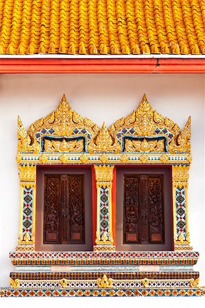 two craved windows with mosaic frame in buddist temple Stock Photo - Budget Royalty-Free & Subscription, Code: 400-04771813