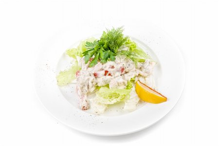 simsearch:400-04307416,k - Tasty salad of seafood and vegetable dish close up on a white background Foto de stock - Super Valor sin royalties y Suscripción, Código: 400-04772431