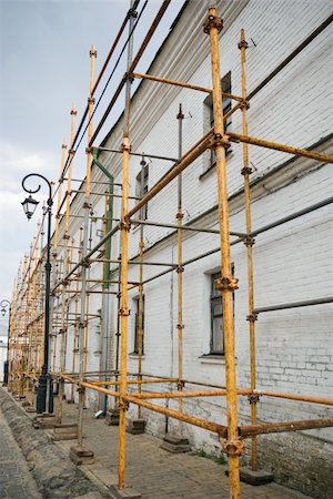 installation of scaffolding before the repair of old buildings Stock Photo - Budget Royalty-Free & Subscription, Code: 400-04772636