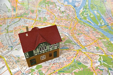 family in a suburban community - Model of a detached house on a city map Stock Photo - Budget Royalty-Free & Subscription, Code: 400-04772675