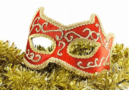 Red venetian carnival mask on gold tinsel Stock Photo - Budget Royalty-Free & Subscription, Code: 400-04772818