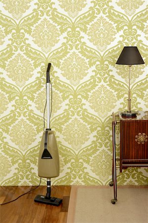 Retro vacuum cleaner vintage sixties room green wallpaper Stock Photo - Budget Royalty-Free & Subscription, Code: 400-04773216