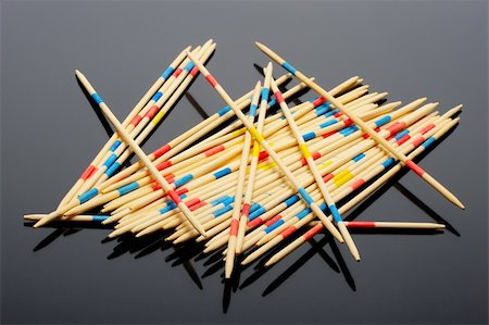 simsearch:400-04811369,k - Wooden sticks to play the Mikado on a black background Stock Photo - Budget Royalty-Free & Subscription, Code: 400-04773604