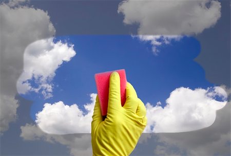 Cleaner is cleaning window which is covered with dust Stockbilder - Microstock & Abonnement, Bildnummer: 400-04784428