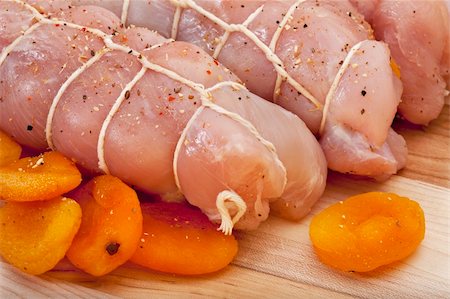 raw turkey breast with seasoning rolled up with apricots ready to cook (Polish cuisine) Stock Photo - Budget Royalty-Free & Subscription, Code: 400-04784460