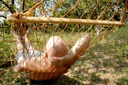 pictures of men sleeping in hammocks - Relaxation in the hammock in summer day Stock Photo - Budget Royalty-Free & Subscription, Code: 400-04785074