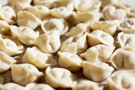 simsearch:400-04025064,k - A lot of uncooked meat dumplings on kitchen preparation table Stock Photo - Budget Royalty-Free & Subscription, Code: 400-04785143