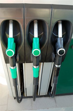 Gas nozzles at the gas station Photographie de stock - Aubaine LD & Abonnement, Code: 400-04785197