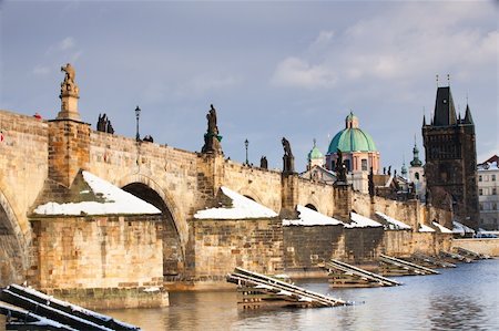 prague scenic - Famous Charles bridge on Vltava river in Prague in winter Stock Photo - Budget Royalty-Free & Subscription, Code: 400-04785236