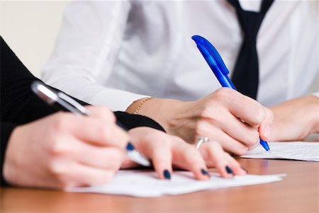 person's female hand signing an important document Stock Photo - Budget Royalty-Free & Subscription, Code: 400-04785294