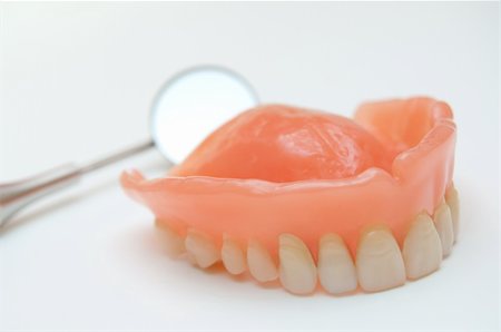 Dentures with a mirror in the background Stock Photo - Budget Royalty-Free & Subscription, Code: 400-04785316