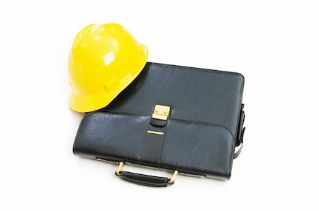 simsearch:400-04909076,k - Construction concept - case and hard hat isolated on white Stock Photo - Budget Royalty-Free & Subscription, Code: 400-04785378