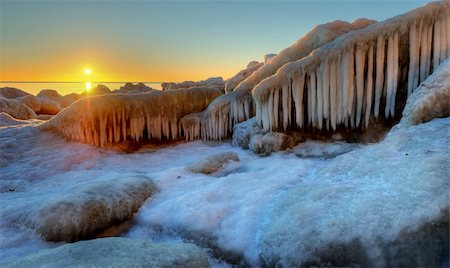 simsearch:400-06176310,k - stones at the beach filled with ice at sunrise Stock Photo - Budget Royalty-Free & Subscription, Code: 400-04786020