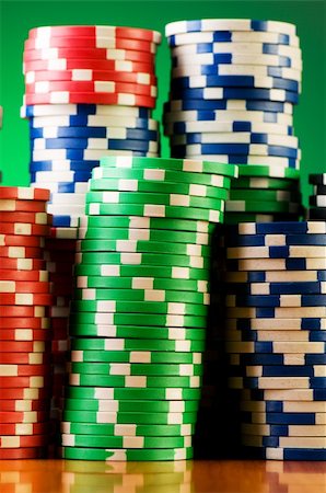 simsearch:400-04736708,k - Stack of casino chips against gradient background Stockbilder - Microstock & Abonnement, Bildnummer: 400-04786121