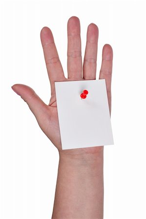 Sheet of paper pinned to a hand on a white background Stock Photo - Budget Royalty-Free & Subscription, Code: 400-04786152
