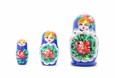 russian dolls - Russian nested dolls standing in a row on white background Stock Photo - Budget Royalty-Free & Subscription, Code: 400-04786741