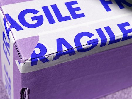 Detail of a fragile corrugated cardboard packet Stock Photo - Budget Royalty-Free & Subscription, Code: 400-04786921