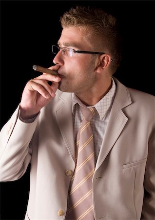 Businessman smoking cigar Stock Photo - Budget Royalty-Free & Subscription, Code: 400-04786995