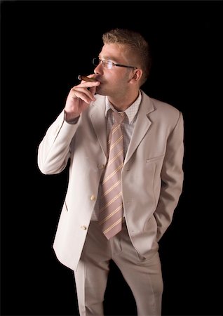 Businessman smoking cigar Stock Photo - Budget Royalty-Free & Subscription, Code: 400-04786996