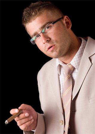 Businessman smoking cigar Stock Photo - Budget Royalty-Free & Subscription, Code: 400-04786998