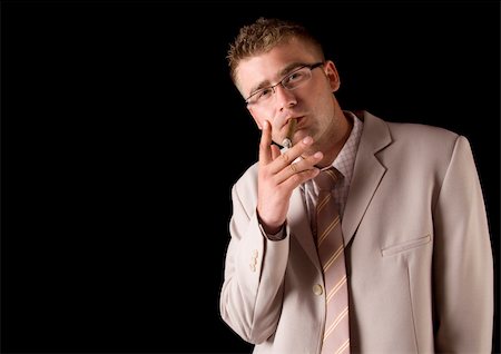 Businessman smoking cigar Stock Photo - Budget Royalty-Free & Subscription, Code: 400-04786999